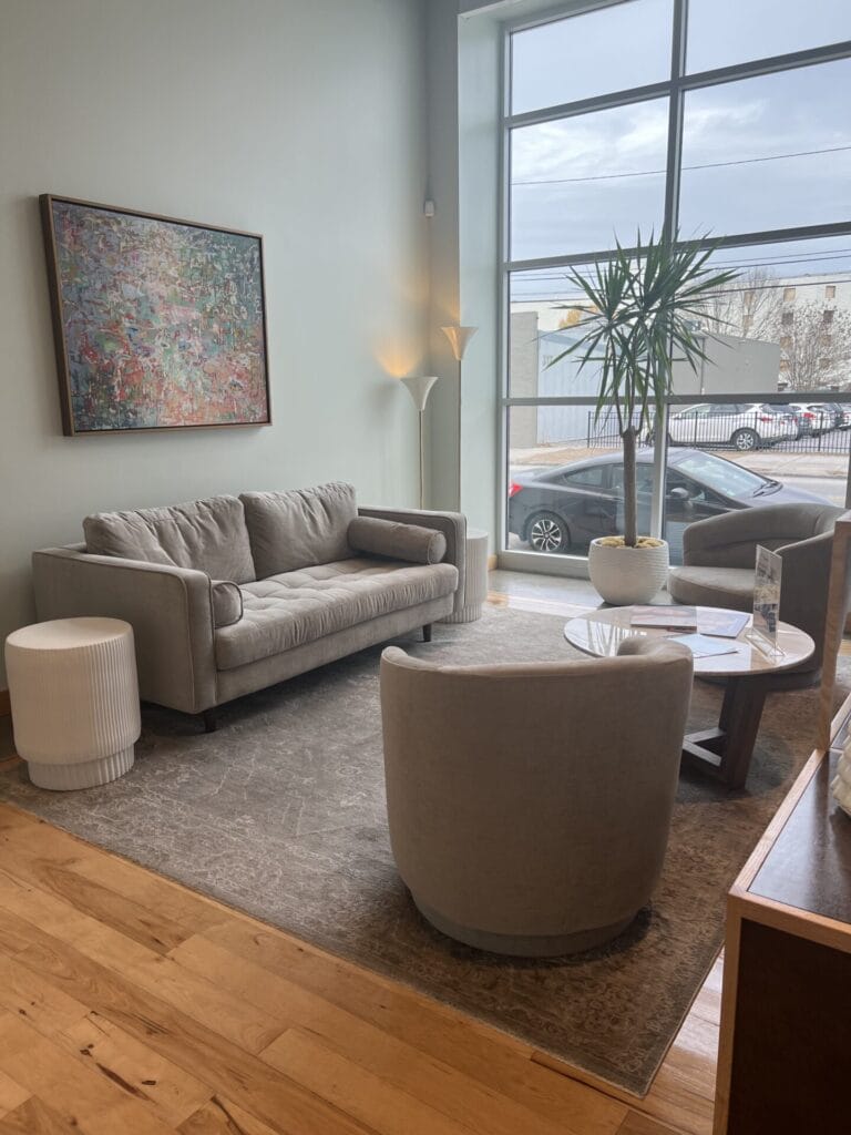 A cozy living room with comfortable couches and a coffee table.